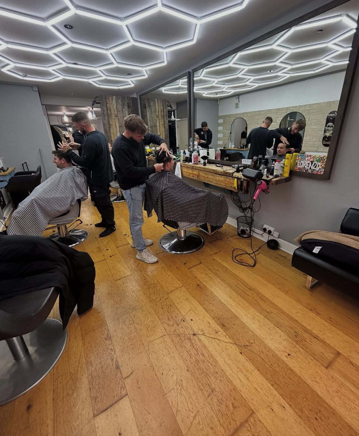 Team working on clients across the shop floor