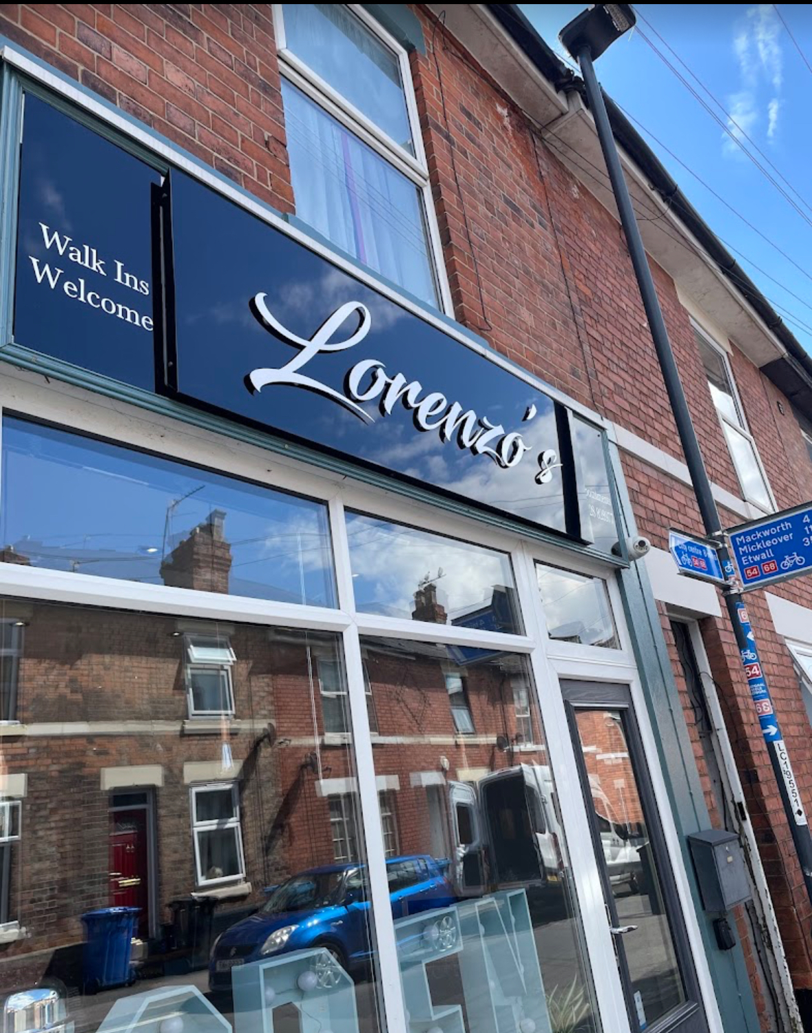 Lorenzo's Barbershop storefront on Campion Street, Derby